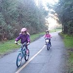 Children cycling on Shoreline Trail, Rocky Point Park
