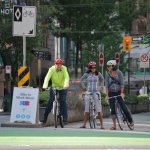 Cyclists at stop sign