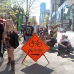 People attended the 420 festival in Vancouver spilled onto the Hornby Street bike lane, completely blocking it