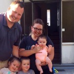 John Marc, the winner of the Totem Pole Bike Rack, with his wife Alyssa and their three children