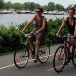 Cyclists enjoy the wind in their hair on the Lachine Canal Bike Path