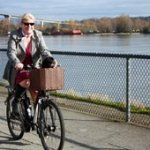 Maggie finds sheer joy riding her electric bike - she doesn't have to drive or use transit, but she can still get around with a combination of muscle and electricity