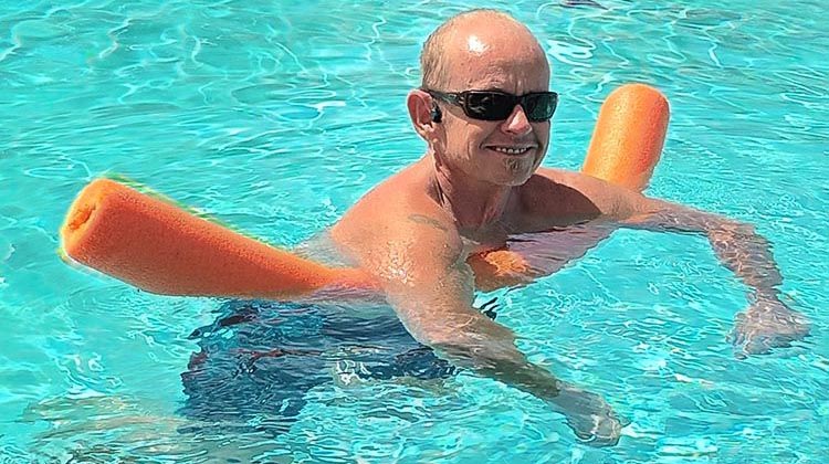 Post header Joe floating in pool with Mojawa headphones What better way to relax your body after a bike ride than getting into the water!